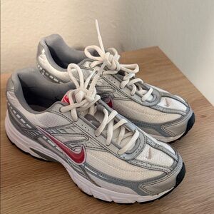 Nike Women's Silver and Red Sneakers